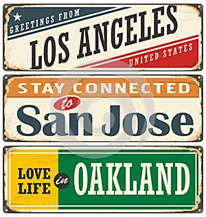 Retro tin sign collection with USA city names