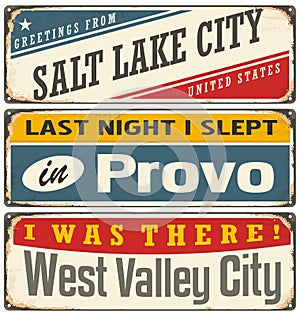 Retro tin sign collection with USA city names