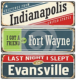 Retro tin sign collection with USA city names