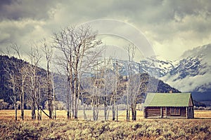 Retro toned old abandoned hut in the Grand Teton National Park,