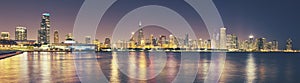 Retro toned panoramic picture of Chicago city skyline at night,
