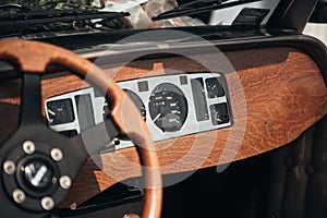 Retro torpedo wedding car with wooden decorations.