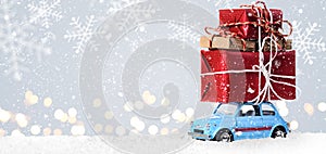 Retro toy car with christmas gifts