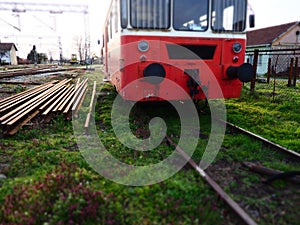 Retro train wagon of red color. Vintage locomotive made in Yugoslavia. Sremska Mitrovica, Serbia. The metal body of a