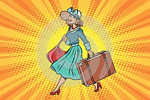 Retro traveler girl with a suitcase