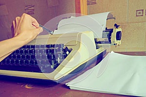 Retro typewriter with a sheet of paper