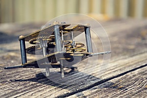 Retro vintage clockwork movement watch mechanism on wood