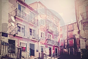 Retro vintage filtered picture of old empty street in Lisbon.