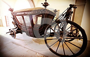 Retro vintage filtered picture of an old wooden carriage.