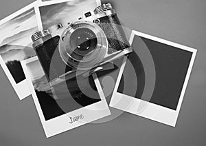 Retro vintage four instant photo frames cards on grey background with images of nature and blank photo with old camera