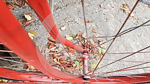 Retro vintage red bike close up. An old charming concept of a classic abandoned bike