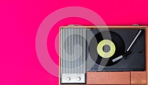 Retro vinyl player and recor player on a background