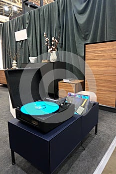 Retro vinyl record player in the interior of the room