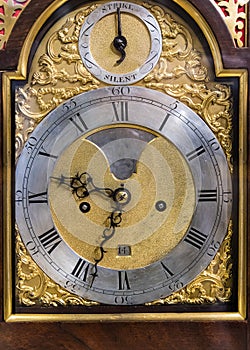 Retro watch. Antique vintage baroque clock on a blank isolate background.