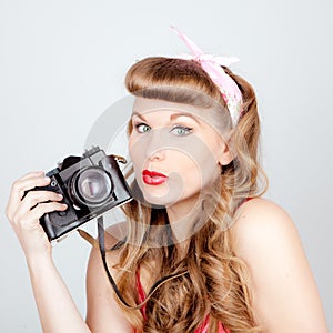 Retro woman with camera