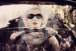 Retro woman driving img