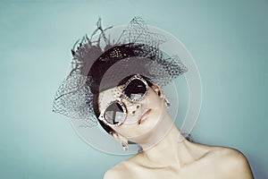 Retro Woman Portrait. Vintage Style Girl Wearing Old fashioned Hat.