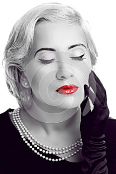Retro woman with red lips. Black and white photo