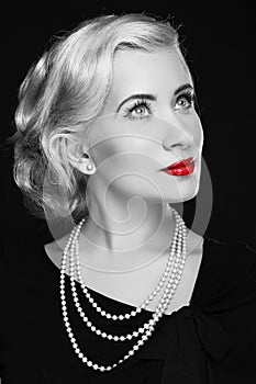 Retro woman with red lips. Black and white photo