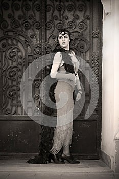 Retro Woman 1920s - 1930s Standing in the Gate