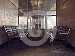 Retro wooden benches at a train station