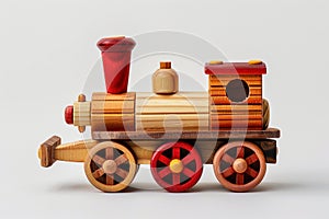 A retro wooden toy steam locomotive with a red pipe