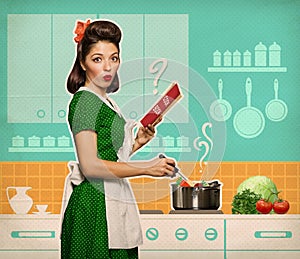 Retro young woman cooking and reading recipe book in her kitchen