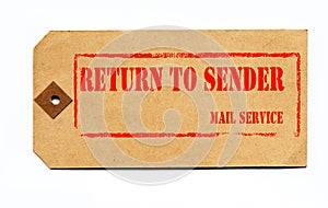 Return to sender. Grunge style on a 1930s tag. photo