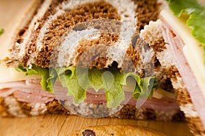 Reuben Sandwich on pumpernickel and rye bread with cookie