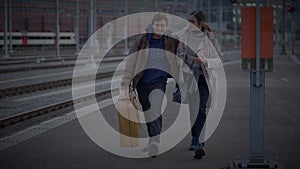 Reunion of Single Mother and Teenage Son Hugging at Railway Platform