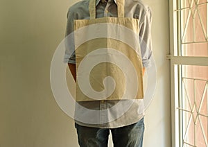 Reusable cotton cloth bag, climate change concept