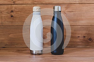 Reusable eco-friendly black and white stainless steel thermo bottles