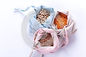 Reusable eco friendly natural cotton produce bags with cereal. Waste packaging. Zero waste food shopping. Plastic free