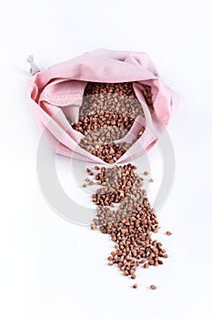 Reusable eco friendly natural cotton produce bags with cereal. Waste packaging. Zero waste food shopping. Plastic free