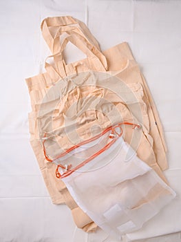 Reusable eco shopping bags. Fruit and vegetable bags. Eco friendly concept. Canvas tote bags