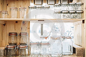 Reusable glass jars in zero waste shop or plastic free store