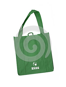 Reusable green shopping bag with recycle symbol photo