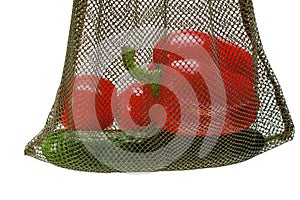 Reusable mesh bag with bright vegetables