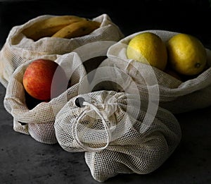 Reusable mesh bags with fruits