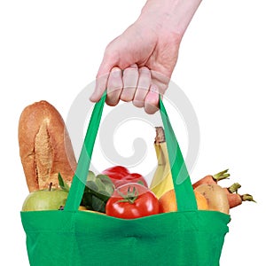 Reusable shopping bag filled with fruits and vegetables photo