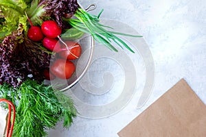 Reusable shopping bag full of groceries isolated on white background