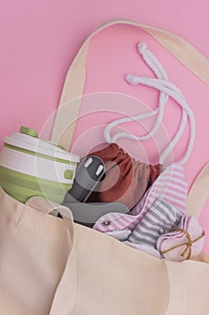 Reusable stuff flat lay on pink background