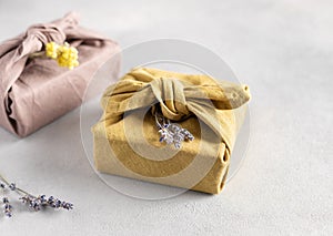 reusable sustainable gift wrapping in linen fabric. Furoshiki gifts