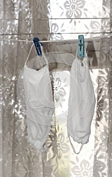 Reusable white medical masks dry after washing