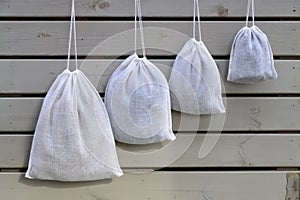 Reusable zero waste linen produce bags hanging photo