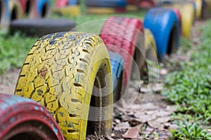 Reuse old tyres for playground