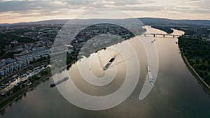 Revealing shot of Ships on the Rhine river in front of Mainz