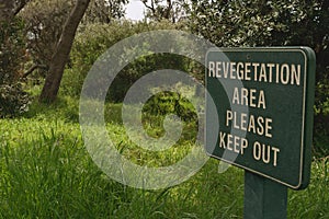 Revegetation area sign
