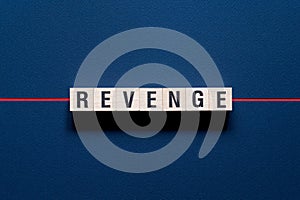 Revenge - word concept on cubes