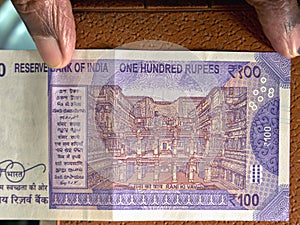 Reverse of the 100 Rupee Bank Note, used in India, .showing heritage site Rani Ki Vav Gujarat